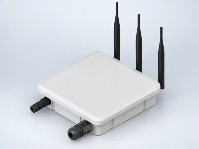Herdwize LoRa gateway in a white IP66 enclosure with external antennas